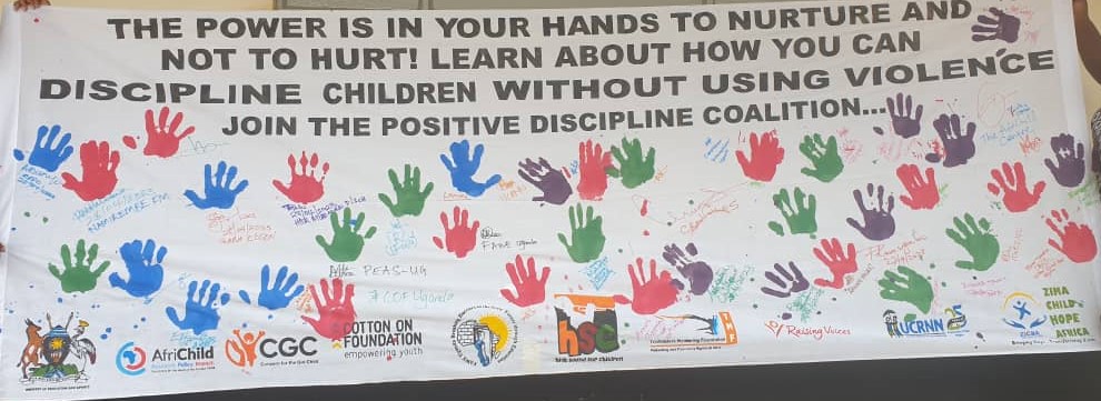AB anner with hand prints in blue, red, and green. that says "The power is in your hands to nurture and not to hutr! Learn about how you can discipline children without using violence. Join the Positive Discipline Coalition..." Logos of participating organizations line the bottom of the banner.